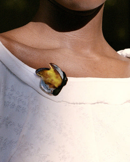 The Stamp Brooch in 𝘚𝘶𝘯𝘴𝘦𝘵